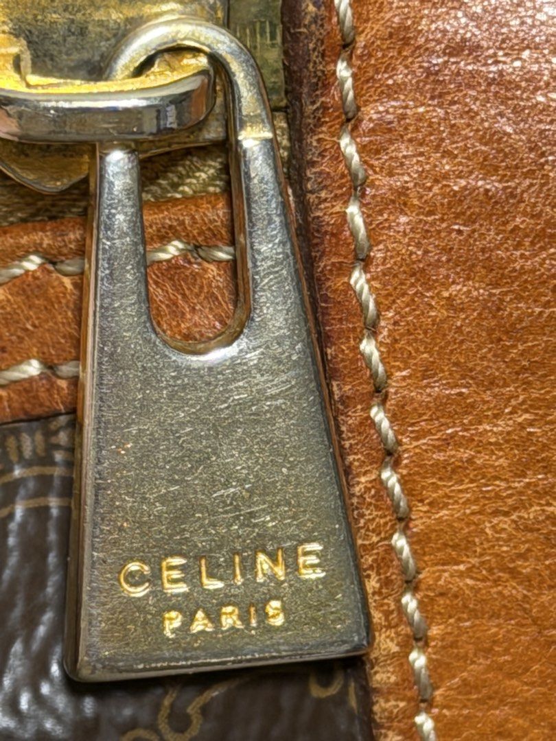 Vintage Celine Macadam (Blazon / Triomphe pattern) Dome / Half-Moon Top-Handle Handbag With Certificate (Category: Purses & Pouches) located in Carmona. Submitted by vetaesencial (Listing ID 1466023098, Image 3). Description: Comes with VEREEV certificate 100% Guaranteed Authentic Swiss-made riri zipper hardware on the interior/exterior, heat-stamped CELINE PARIS / MADE IN ITALY leather tag, and serial code M95 Patina vachetta / tanned leather Cl