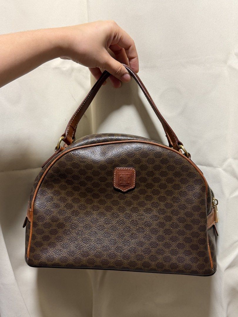 Vintage Celine Macadam (Blazon / Triomphe pattern) Dome / Half-Moon Top-Handle Handbag With Certificate (Category: Purses & Pouches) located in Carmona. Submitted by vetaesencial (Listing ID 1466023098, Image 1). Description: Comes with VEREEV certificate 100% Guaranteed Authentic Swiss-made riri zipper hardware on the interior/exterior, heat-stamped CELINE PARIS / MADE IN ITALY leather tag, and serial code M95 Patina vachetta / tanned leather Cl