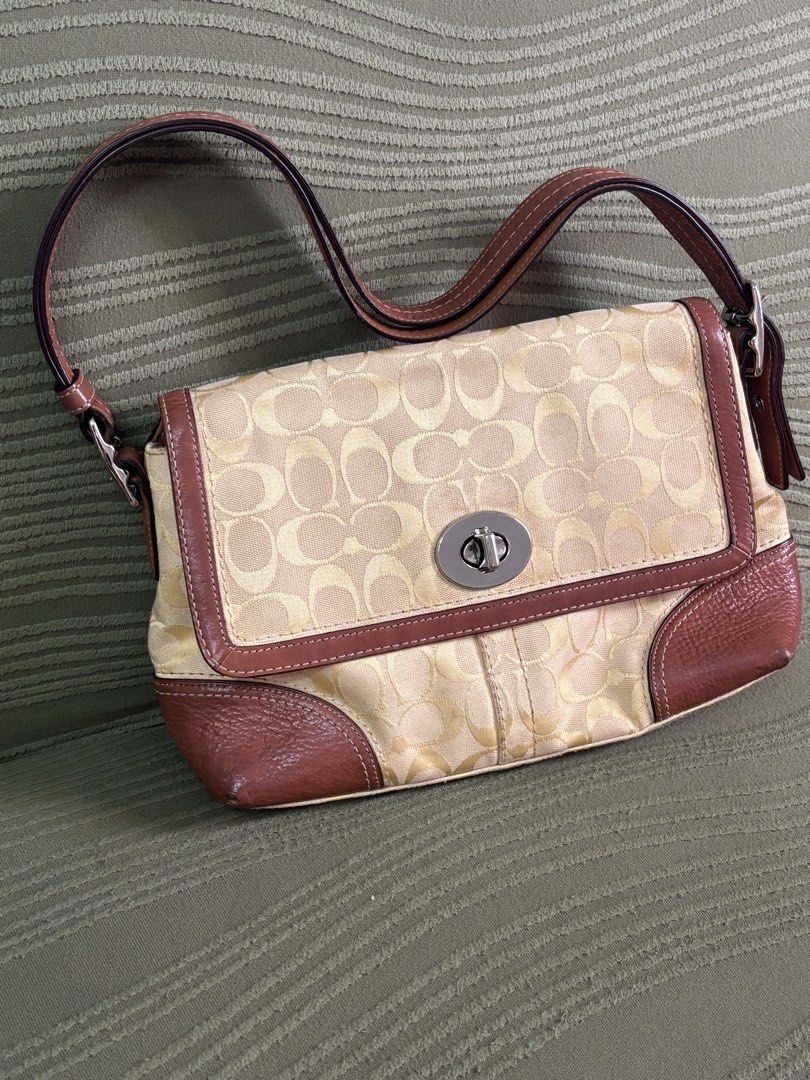 5-DAY SALE ONLY. FIXED PRICE. Auth Rare Vintage Coach Hampton Butter Yellow (Category: Luxury Bags & Wallets) located in Batangas. Submitted by missraee (Listing ID 1466007496, Image 2). Description: 5-day SALE. FIXED PRICE. Back to old price after 5 days ☺️ Original price 7k - Authentic Coach signature C canvas shoulder bag - Features brown leather trim and bottom corner patches - Secure silver-tone turnlock closure on front flap - Brown fabric 
