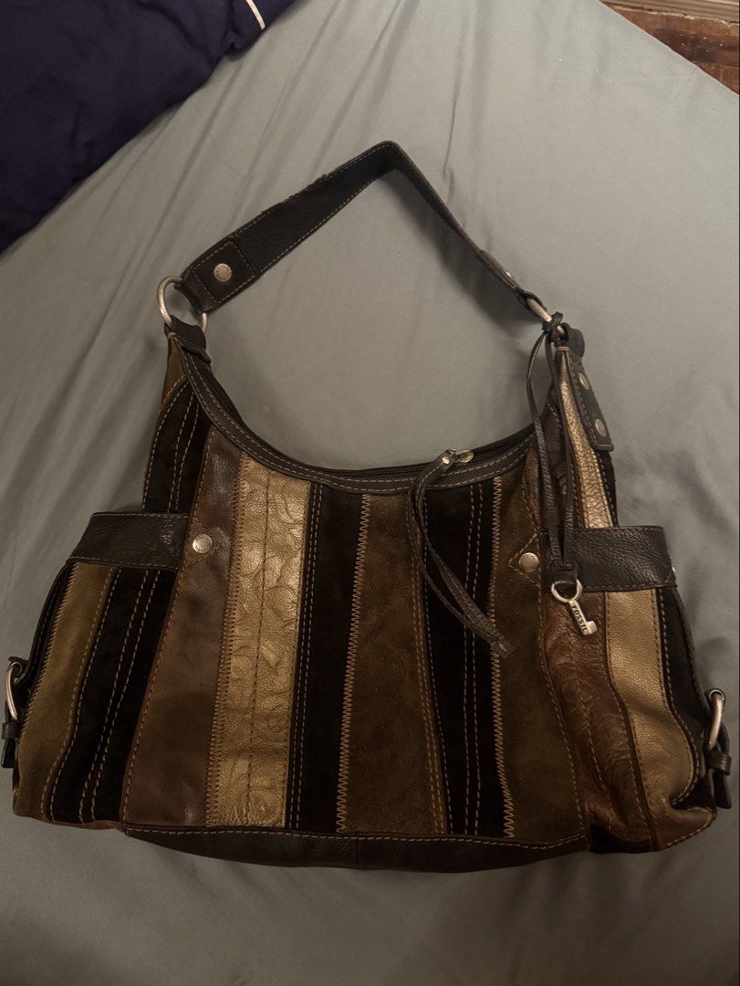 Vintage Fossil Patchwork Bag (Category: Luxury Bags & Wallets) located in Makati City. Submitted by 27snoopycart (Listing ID 1466079028, Image 1). Description: - Brand: Fossil - Style: Vintage Patchwork shoulder bag - Condition: 8/10, overall great condition except the small part in the handle - For negotiation! .