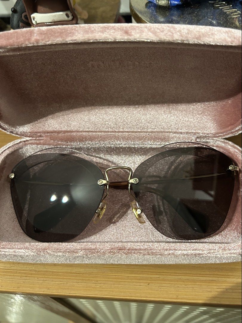 Vintage Miu Miu Sunglasses (Category: Sunglasses & Eyewear) located in Cebu City. Submitted by twicetoldtales (Listing ID 1466135457, Image 1). Description: - Trendy oversized round gradient sunglasses - Elegant thin gold-tone metal frames and hardware - Clean lenses and sturdy, durable hinges - Includes original plush pink velvet hard case - Perfect for daily wear or as a stylish gift.