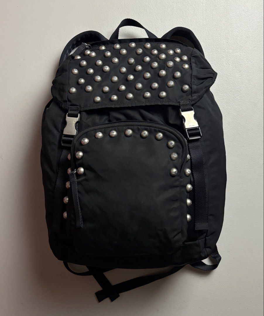 Vintage Prada Black Studded Nylon Backpack (Category: Luxury Bags & Wallets) located in Manila. Submitted by hippiesph (Listing ID 1466115290, Image 1). Description: VINTAGE PRADA - nylon bagpack Authentic Still in great condition No issue Dm me for more details 📩.