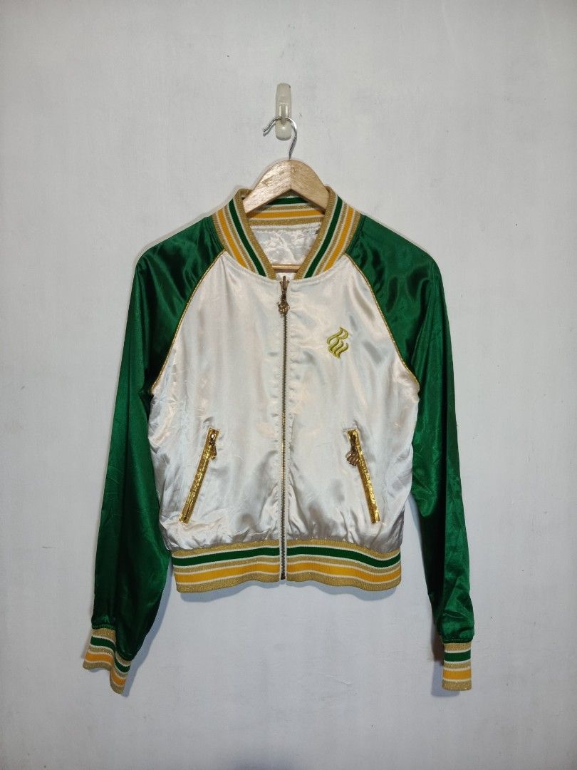 VINTAGE ROCAWEAR REVERSIBLE SATIN JACKET (Category: Coats, Jackets and Outerwear) located in Baguio. Submitted by 074thriftmania (Listing ID 1466115712, Image 1). Description: - Brand: Rocawear - Style: Reversible satin bomber jacket - Colorway: Green and white with gold embroidery - Details: Striped ribbed collar, cuffs, and hem, full zip closure, zipped side pockets - Side A: Plain white body, green sleeves, and chest logo embroidery - Side B: 