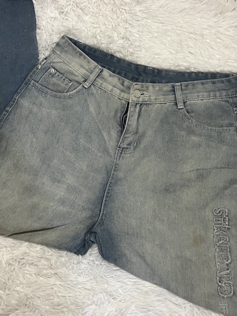 Vintage Wash Distressed Denim Jeans (Category: Jeans) located in Tuguegarao City. Submitted by love_clothies (Listing ID 1465968937, Image 3). Description: - Style: Casual streetwear, relaxed fit - Wash: Two-tone faded with darker legs - Details: Embroidered lettering down the left leg - Features: Button closure, zipped fly, classic five-pocket setup - Width: 17 inch, Length: 40 1/2 inch.
