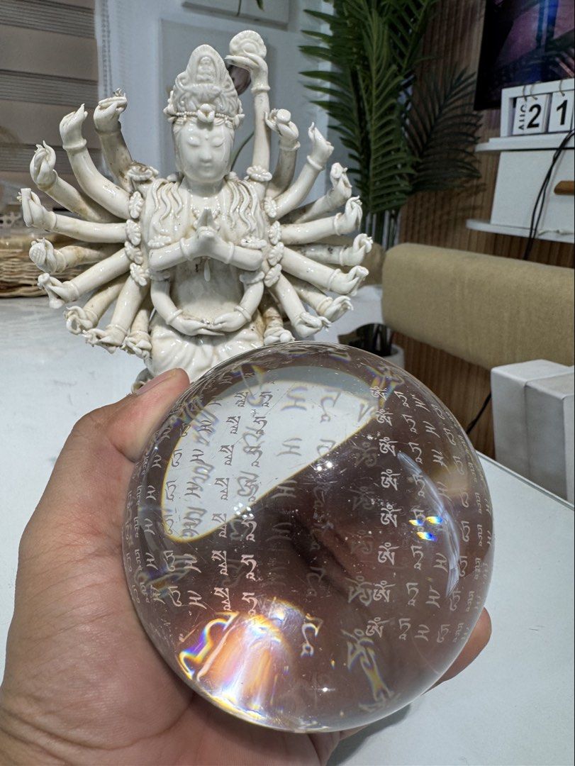 Vintage White Multi-Armed Guanyin Ceramic Statue (Category: Religious Items) located in Quezon City. Submitted by luckypicker.25 (Listing ID 1466059395, Image 2). Description: Elegant white ceramic Guanyin statue seated on a lotus base. Features detailed hand gestures and symmetrical multi-armed design. Hollow center hole at the bottom base. Has some natural staining and discoloration on the back and bottom due to age. Perfect for home altars, me