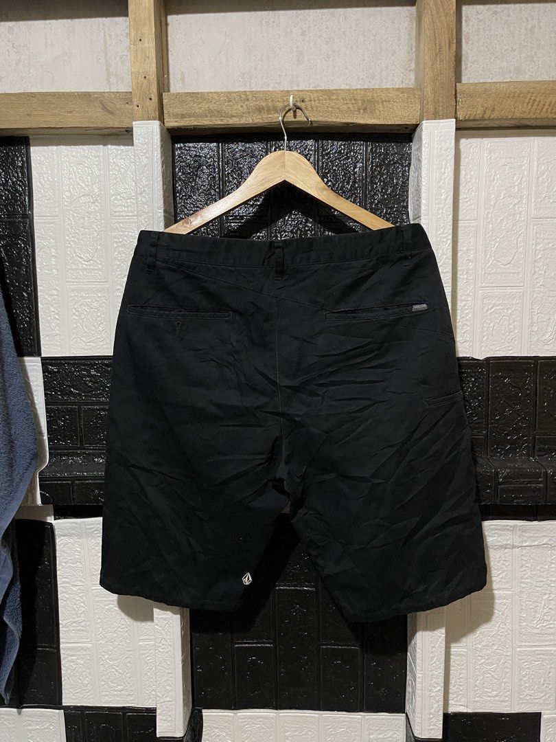 Volcom Black Shorts (Category: Shorts) located in Lopez. Submitted by thrift.ni.roms22 (Listing ID 1466151263, Image 2). Description: - Brand: Volcom - Color: Classic Black - Style: Casual shorts with button closure and belt loops - Details: Embroidered Volcom stone logo near the hem - Pockets: Functional back pockets with branded label tag - Condition: Great pre-loved staple piece, perfect for warm weather and daily wear.