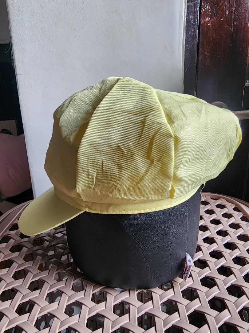 Wario Yellow Cap With Blue W Logo (Category: Caps & Hats) located in Meycauayan. Submitted by MP_Shop (Listing ID 1465987695, Image 2). Description: - Color: Bright yellow with blue 'M' embroidered inside a white circle - Material: Comfortable cotton blend with inner lining - Fit: Adjustable back strap for a custom fit - Condition: Clean interior and exterior, ready to wear - Style: Classic solid brim baseball cap.