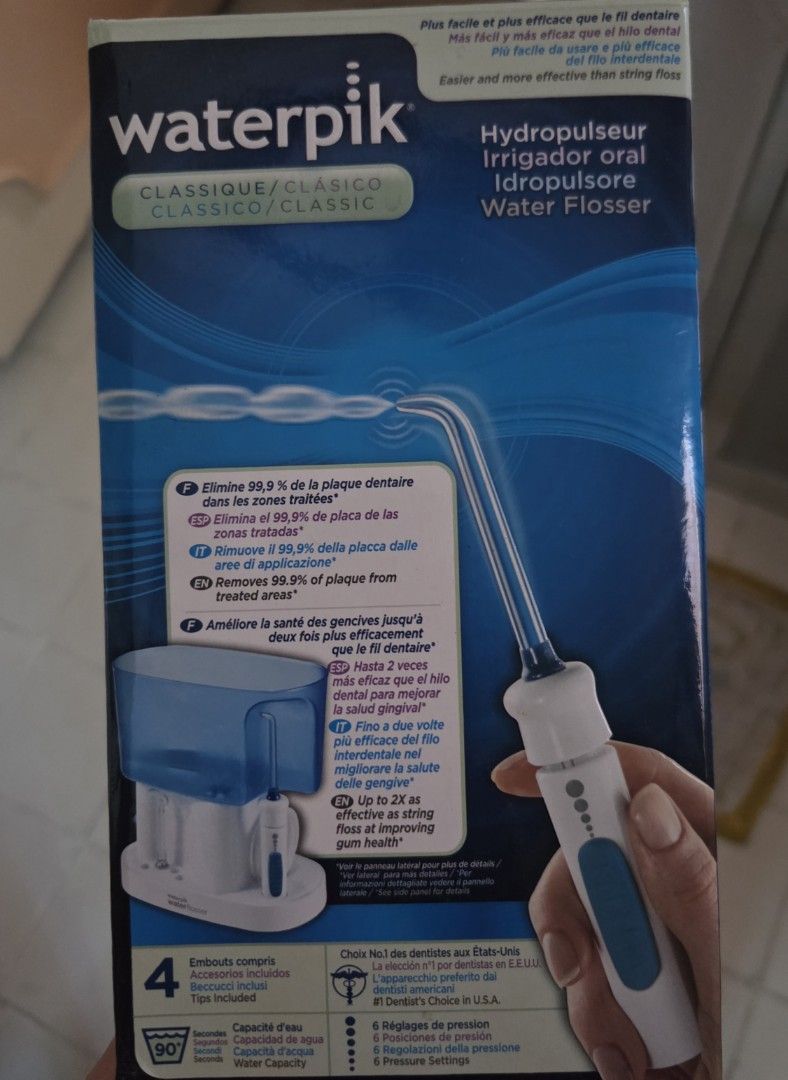 Waterpik Classic Water Flosser (Category: Oral Care) located in Quezon City. Submitted by liquidatormnl (Listing ID 1465961508, Image 3). Description: - Authentic Waterpik water flosser for daily dental care - High-volume blue reservoir that conveniently doubles as a cover - Handle equipped with an adjustable pressure control system - Includes multiple tip attachments stored right in the base - Effectively removes plaque and massages gums - Compl