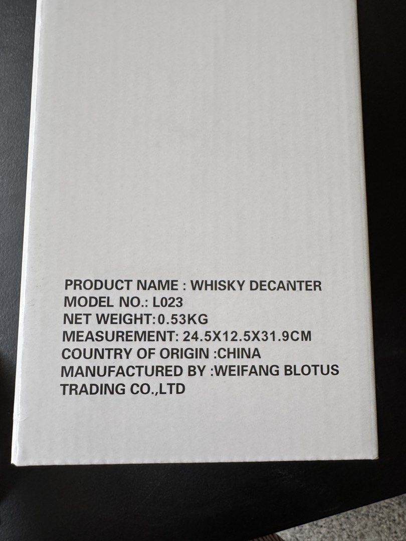 Whisky Decanter Barrel Set Model L023 (Category: Pitchers & Dispensers) located in Quezon City. Submitted by jrc_98 (Listing ID 1465986158, Image 2). Description: - Brand new and factory sealed whisky decanter set (Model: L023) - Unique wooden barrel design featuring an intricate etched ship inside - Includes a convenient glass tap dispenser, sturdy wooden stand, and round stopper - Manufactured by Weifang Blotus Trading Co., Ltd. (Product of Chi