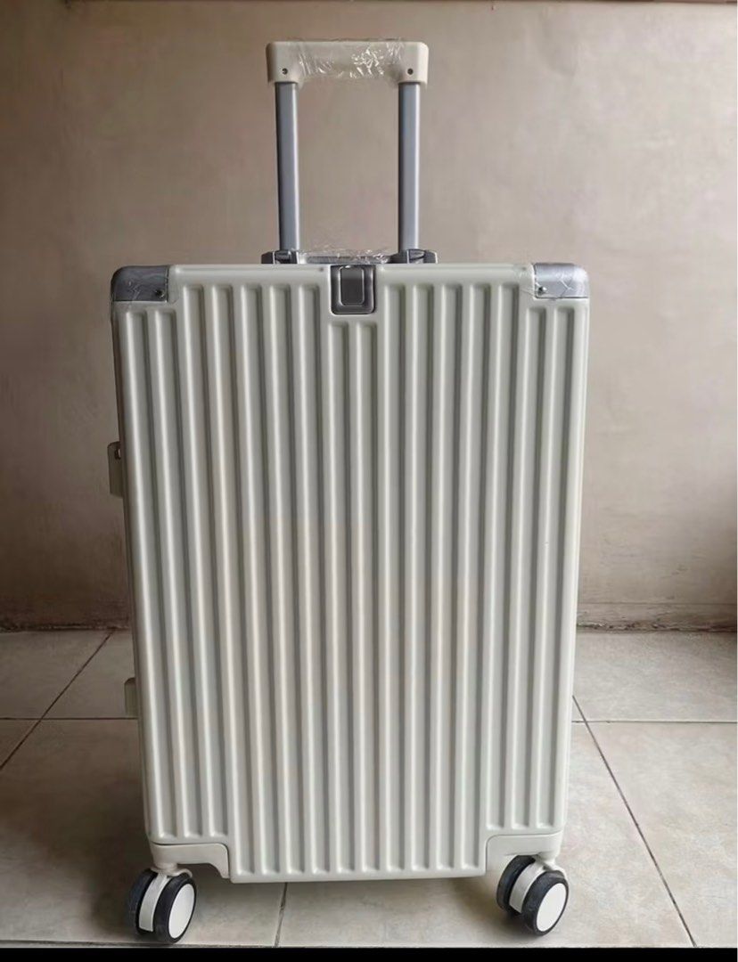 White Hard Shell Luggage With TSA Locks (Category: Luggage) located in Davao. Submitted by _yourfavirgooo (Listing ID 1465956436, Image 1). Description: Sizes: 24 inches: 64*39*24cm Weight: 4.1KG RFS: To declutter and make space at home. Luggage Shell: Hard Shell Wheel Style: Spinner Wheels Features: Anti-Theft, Built-in Organizer, Lock, Scratchproof, USB Port Pick-Up Location: Abreeza Mall or El Rio Ph2, Davao City.