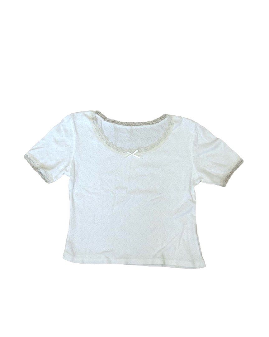white lace trim short sleeve top (Category: Shirts) located in Manila. Submitted by nikkishops (Listing ID 1466034049, Image 1). Description: heart-pointelle style design. scoop neck with cream lace trim, vvv pretty!!! 😍 presko fabric, perfect for school or casual wear :) M-L!.