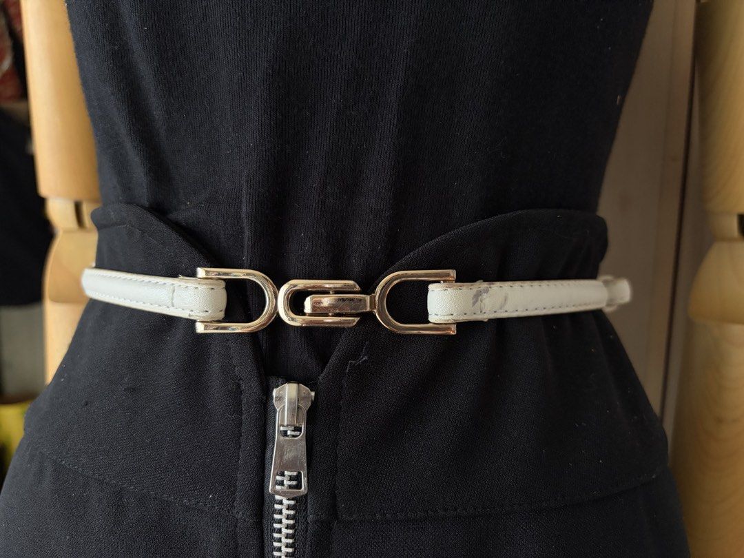 9. White Slim Leather Belt (Category: Belts) located in Quezon City. Submitted by wagwagan_ukay_blues (Listing ID 1466016248, Image 2). Description: From Japan In good used condition Please expect signs of usage Overall -23”-38” Width -.4” Novaliches Qc .