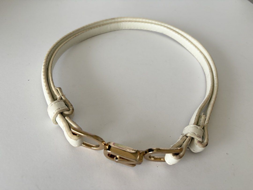 9. White Slim Leather Belt (Category: Belts) located in Quezon City. Submitted by wagwagan_ukay_blues (Listing ID 1466016248, Image 3). Description: From Japan In good used condition Please expect signs of usage Overall -23”-38” Width -.4” Novaliches Qc .