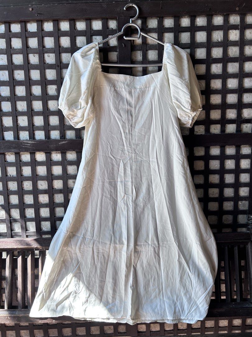 White Square Neck Puff Sleeve Dress (Category: Dresses) located in Makati City. Submitted by hzsans92 (Listing ID 1466105376, Image 1). Description: - Color: White - Style: Casual midi dress with flared skirt silhouette - Neckline: Trendy square neckline - Sleeves: Short puff sleeves with gathered elastic detail - Fabric: Lightweight and breathable for warm weather - Fit: Easy to slip on and wear.