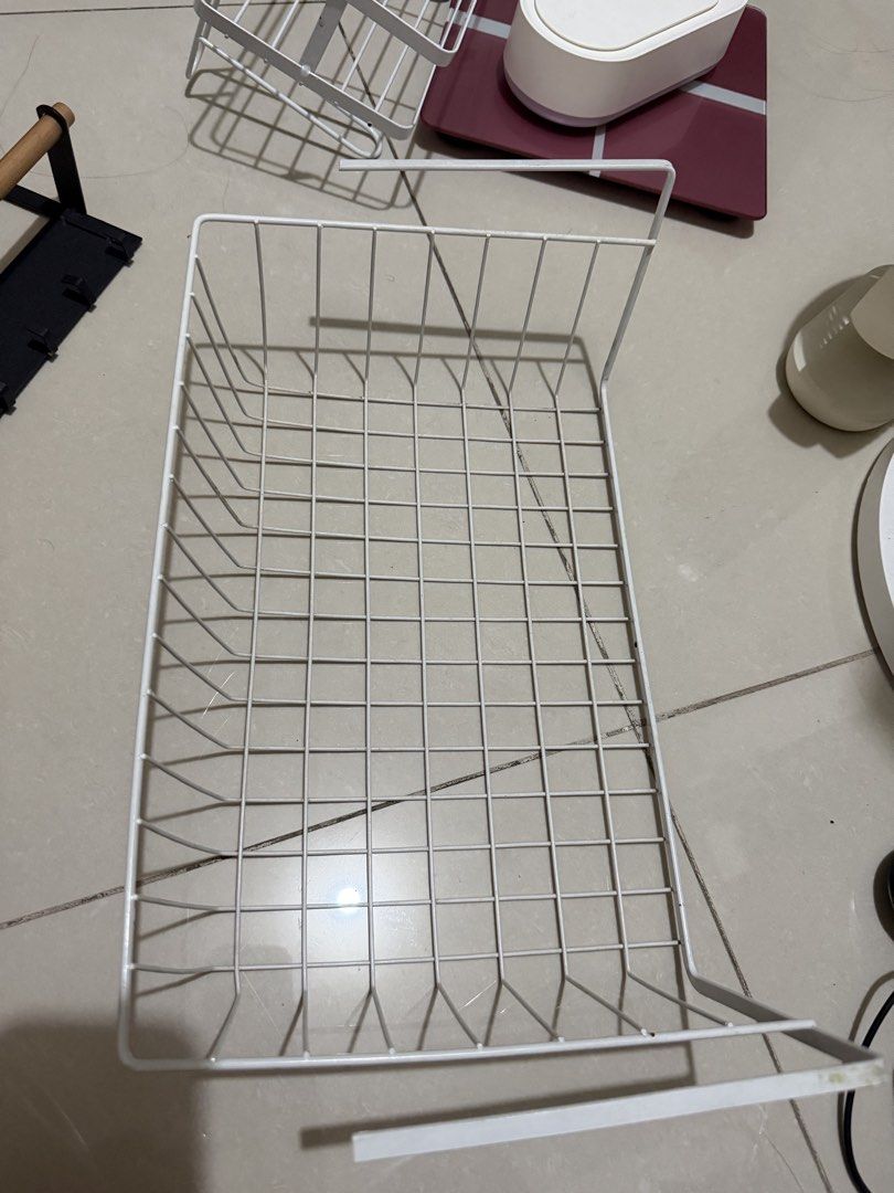 White Wire Under Shelf Storage Basket (Category: Storage Boxes & Baskets) located in Makati City. Submitted by japaneseshop (Listing ID 1466109302, Image 1). Description: - Color: White - Material: Sturdy metal wire - Function: Slides easily onto shelves for instant extra storage - Best for: Kitchen cabinets, pantries, or wardrobe shelves - Condition: Clean and ready to use.