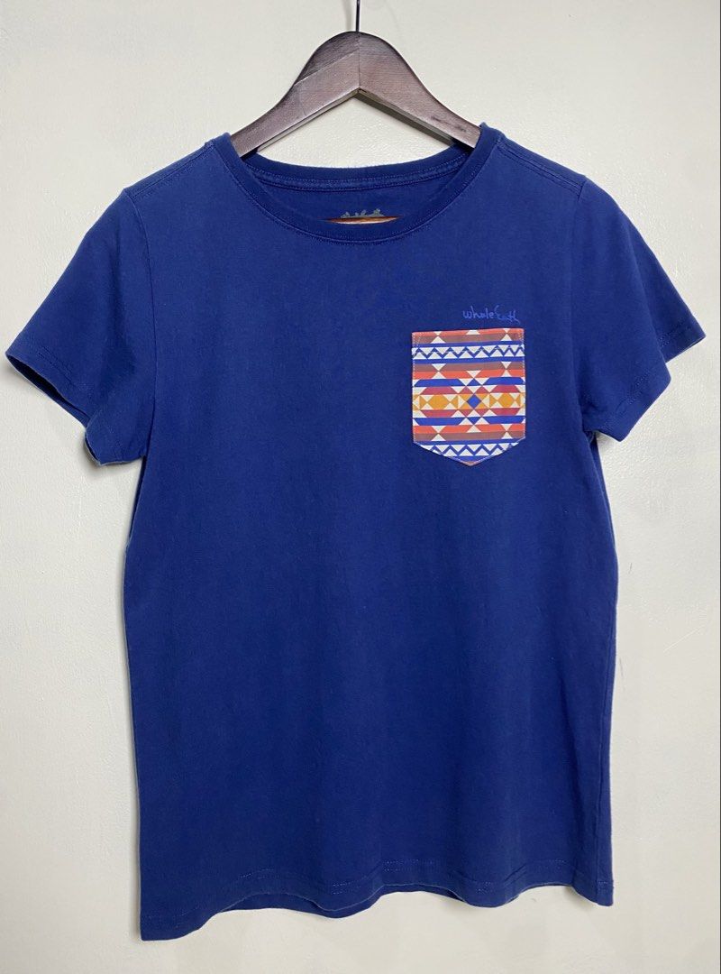 Whole earth Japan pocket tee (Category: Shirts) located in Makati City. Submitted by indaysukaycloset (Listing ID 1466019703, Image 1). Description: WHOLE EARTH JAPAN POCKET TEE Brand: Whole Earth - Japan Brand Color: NVY (48) - Royal / Navy Blue Size: M on tag - Fits S-M for girls, S for boys Details: - Material: Cotton 100% - presko, soft, hindi mainit - Pocket: Tribal / Aztec / Navajo print - orange, blue, yellow - Front logo: "Whole Earth" sm