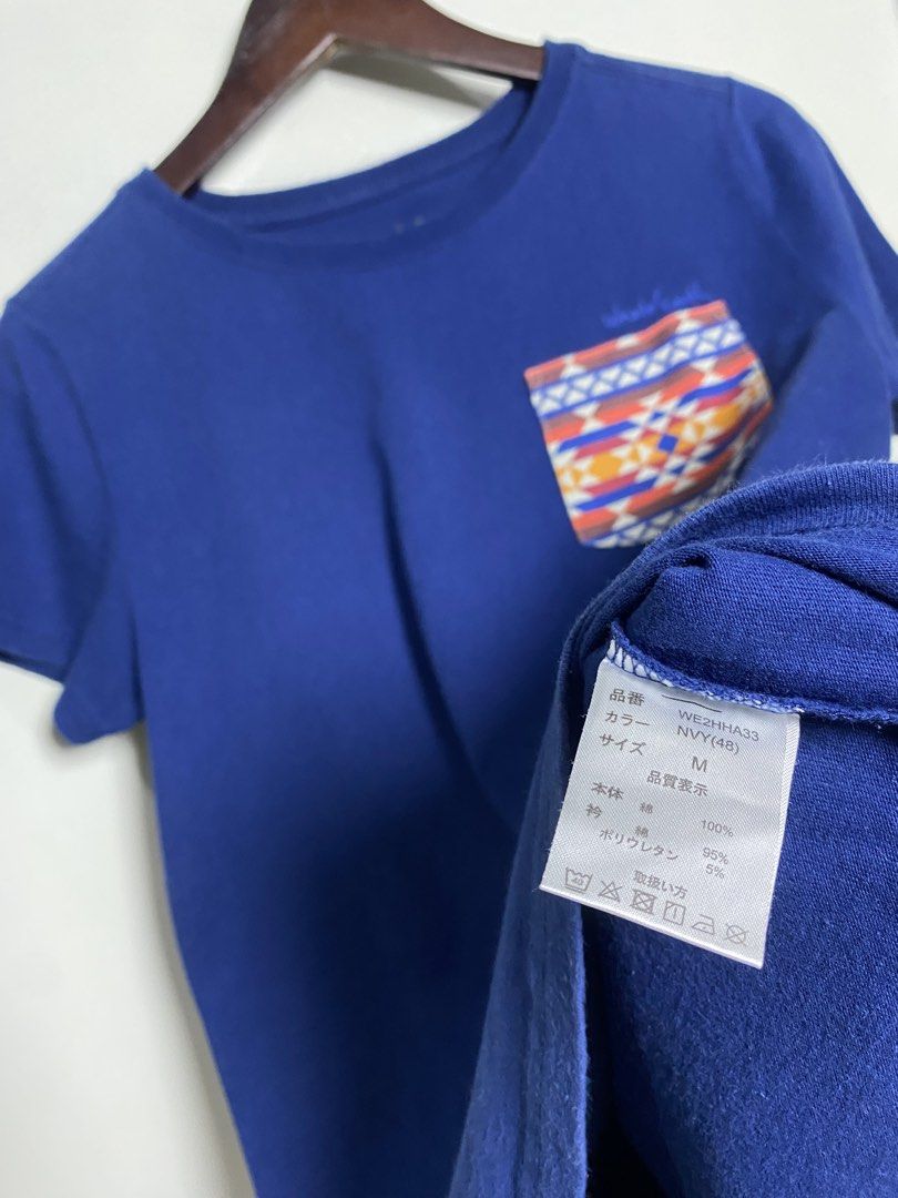 Whole earth Japan pocket tee (Category: Shirts) located in Makati City. Submitted by indaysukaycloset (Listing ID 1466019703, Image 3). Description: WHOLE EARTH JAPAN POCKET TEE Brand: Whole Earth - Japan Brand Color: NVY (48) - Royal / Navy Blue Size: M on tag - Fits S-M for girls, S for boys Details: - Material: Cotton 100% - presko, soft, hindi mainit - Pocket: Tribal / Aztec / Navajo print - orange, blue, yellow - Front logo: "Whole Earth" sm