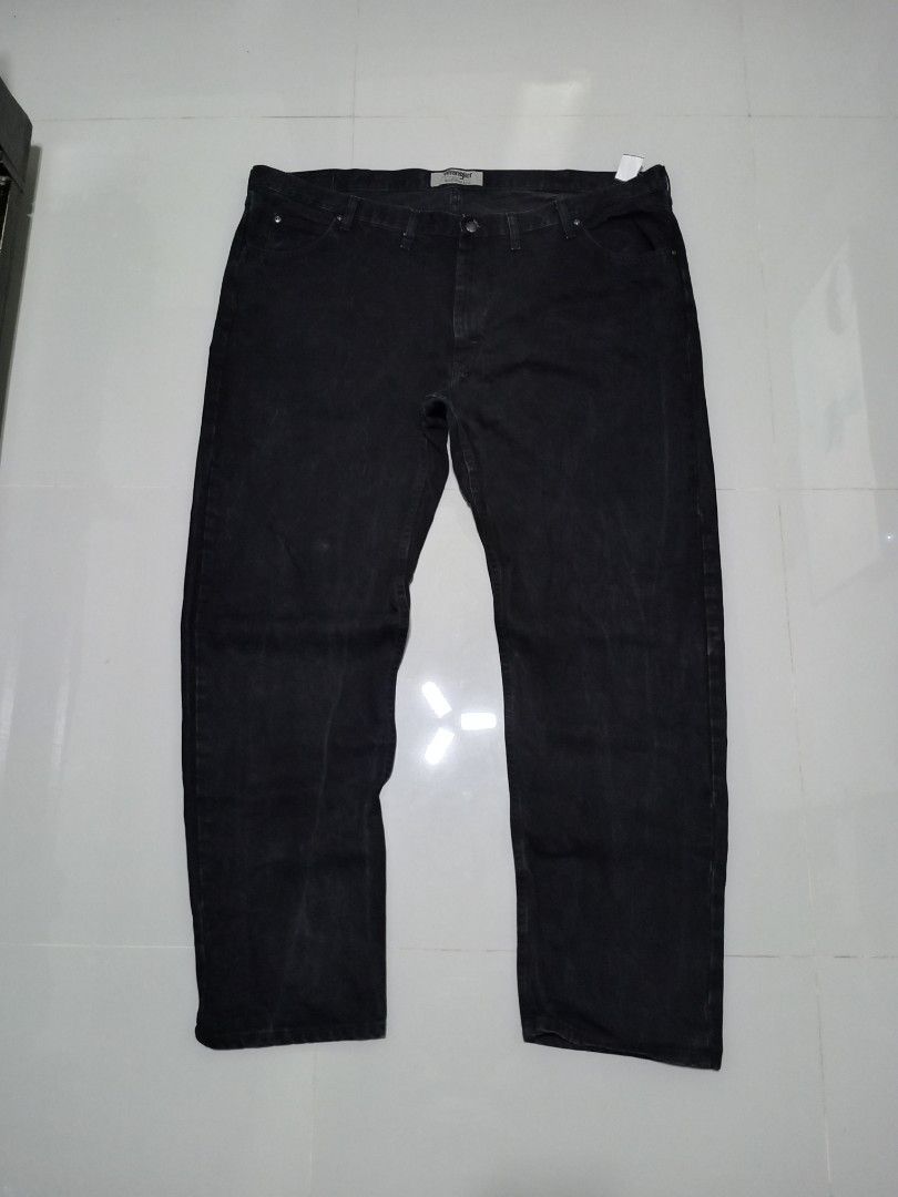 Wrangler Authentics Black Denim Pants Size 48x34 (Category: Jeans) located in Magdalena. Submitted by magdalenathrift20 (Listing ID 1466085603, Image 2). Description: - Brand: Wrangler Authentics - Color: Solid Black (with minor fading from regular wear/wash) - Tag Size: 48x34 - Actual Measurements: Waist 48-50 inches | Length 48 inches - Material: 100% Cotton, Made in Mexico - Style: Classic five-pocket design with button and zip fly closure - C