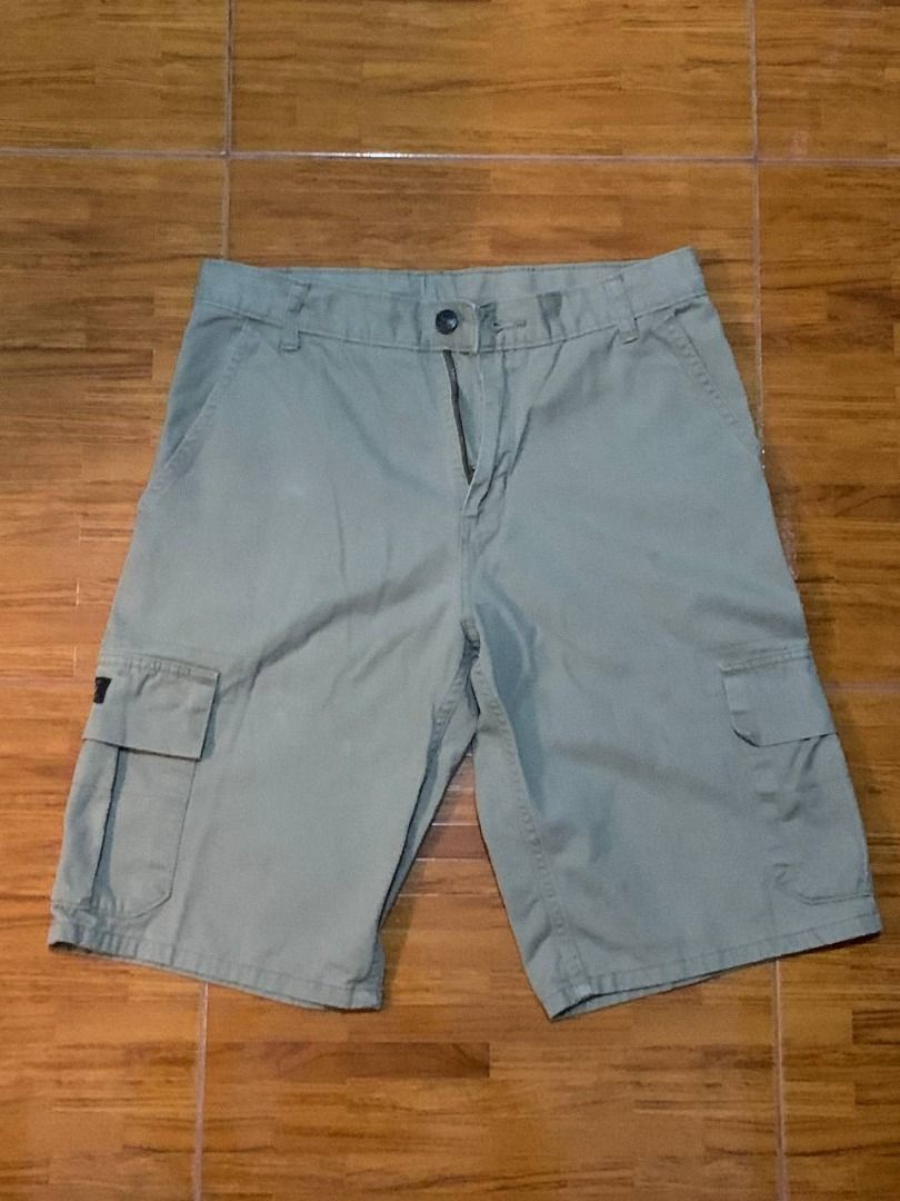 Wrangler Authentics Cargo Shorts Khaki Size 16 Regular (Category: Shorts) located in Davao. Submitted by thrift_solemates (Listing ID 1466053251, Image 1). Description: - Brand: Wrangler Authentics - Size: 16 Regular (Waist 28-29) - Material: 100% Cotton - Color: Khaki - Features: Multiple side pockets, button and zip fly closure - Origin: Made in Bangladesh - Style: Solid, casual everyday wear.