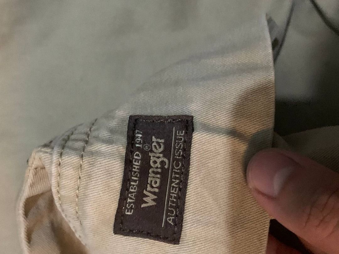 Wrangler Authentics Cargo Shorts Khaki Size 16 Regular (Category: Shorts) located in Davao. Submitted by thrift_solemates (Listing ID 1466053251, Image 2). Description: - Brand: Wrangler Authentics - Size: 16 Regular (Waist 28-29) - Material: 100% Cotton - Color: Khaki - Features: Multiple side pockets, button and zip fly closure - Origin: Made in Bangladesh - Style: Solid, casual everyday wear.