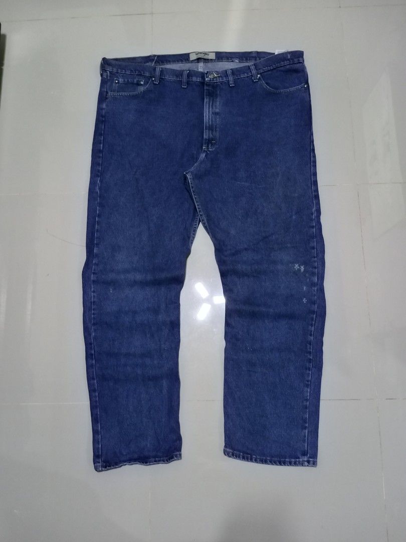 Wrangler Denim Blue Pants Size 48x34 (Category: Jeans) located in Magdalena. Submitted by magdalenathrift20 (Listing ID 1466085524, Image 2). Description: Wrangler denim blue pants, size 48x34. Classic straight-leg style with button closure and belt loops. Back pockets include the signature Wrangler patch. Made in Mexico from 100% cotton denim. Solid blue wash with everyday wear..