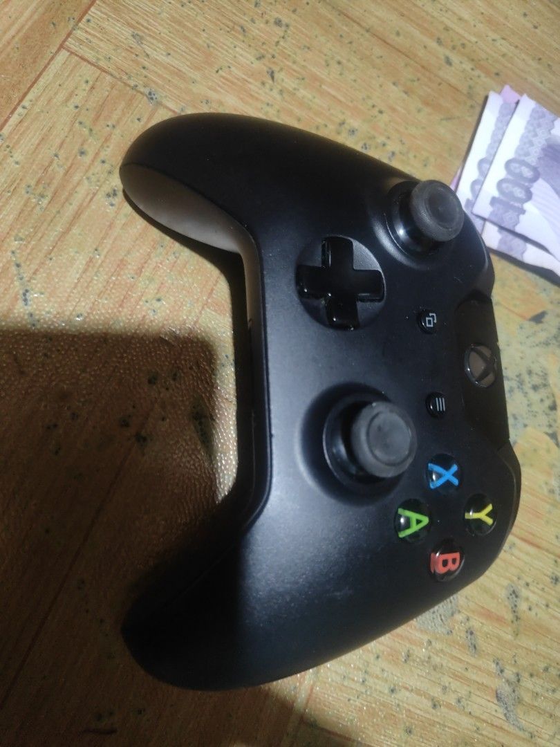 Xbox One Wireless Controller and PlayStation 4 DualShock Controller bundle (Category: Controllers) located in Manila. Submitted by wuxue998 (Listing ID 1466051772, Image 1). Description: - Bundle includes: 1x Black Microsoft Xbox One wireless controller and 1x Black Sony PlayStation 4 DualShock controller - Features: Standard layouts, iconic face buttons, central touchpad, and thumbsticks - Connectivity: Standard ports and wireless functionality 