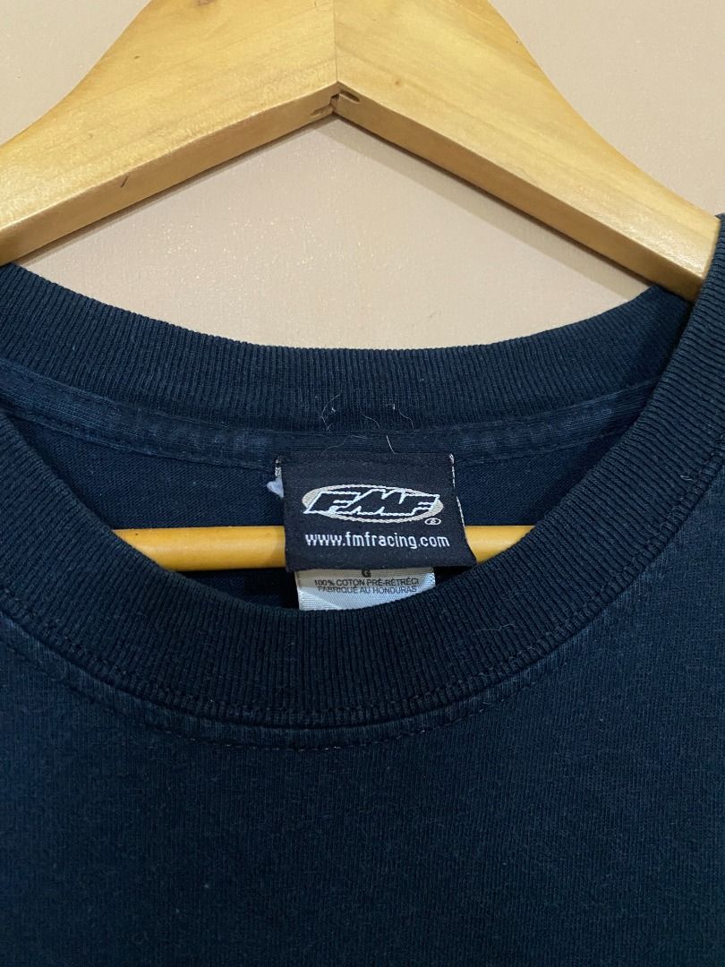 Y2K FMF Racing Chrome Flame Logo (Category: Tshirts & Polo Shirts ) located in Cadiz. Submitted by thespotcdz (Listing ID 1465975129, Image 3). Description: Large on tag Width 21.5" Length 29.5" 8.5/10 rate w/ cracks on prints.