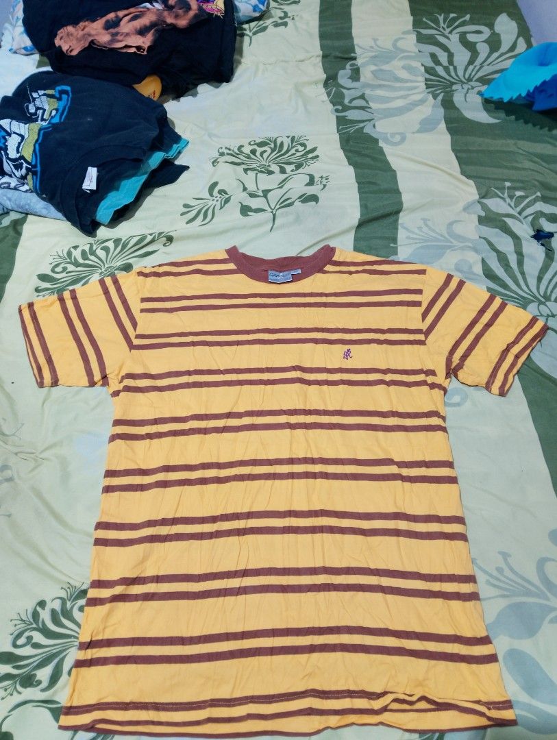 Y2K Gramicci Stripe shirt (Category: Tshirts & Polo Shirts ) located in Iloilo. Submitted by silverowl.f96a66 (Listing ID 1466097857, Image 1). Description: size M 28x22 excellent condition.