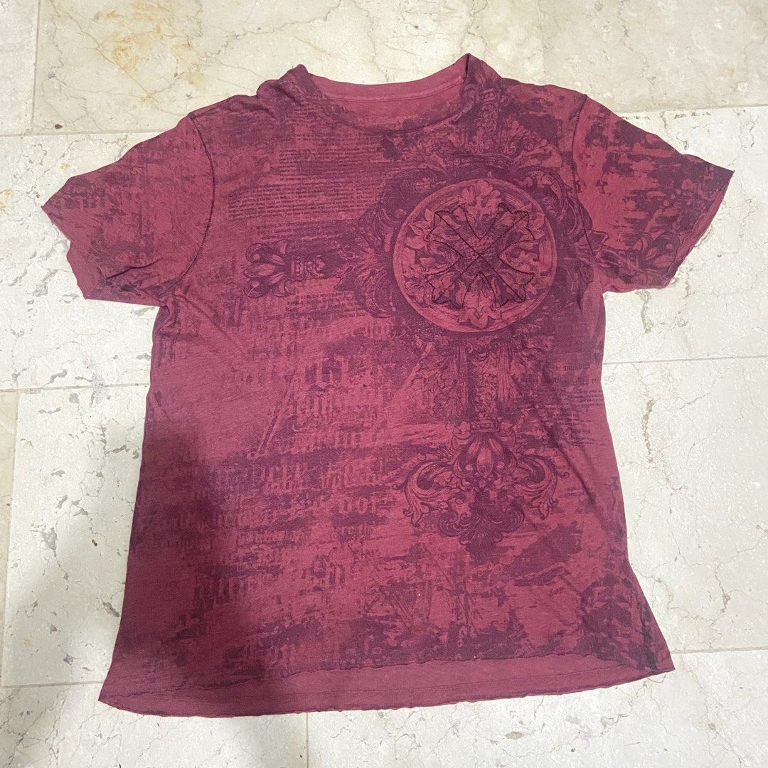 y2k helix graphic tee (Category: Activewear) located in Mabalacat. Submitted by jowii67 (Listing ID 1466059624, Image 2). Description: - Color: Maroon (washed red hue) - Fit: Relaxed fit with a classic crew neck - Material: Soft, comfortable cotton - Design: All-over vintage print with distressed script details - Highlights: Large ornate double-headed eagle crest graphic on the back and matching intricate crest on the front right chest DIMES: siz