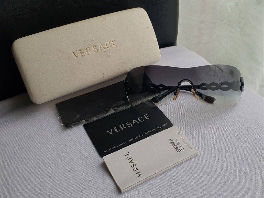 Y2K Versace Wrap-around Sunglasses (Category: Sunglasses & Eyewear) located in Quezon City. Submitted by WasalakTwo (Listing ID 1466150791, Image 1). Description: Bought in Japan Good as new Goodcondition Complete inclusions Yung box lang ang luma Open for delivery nationwide.