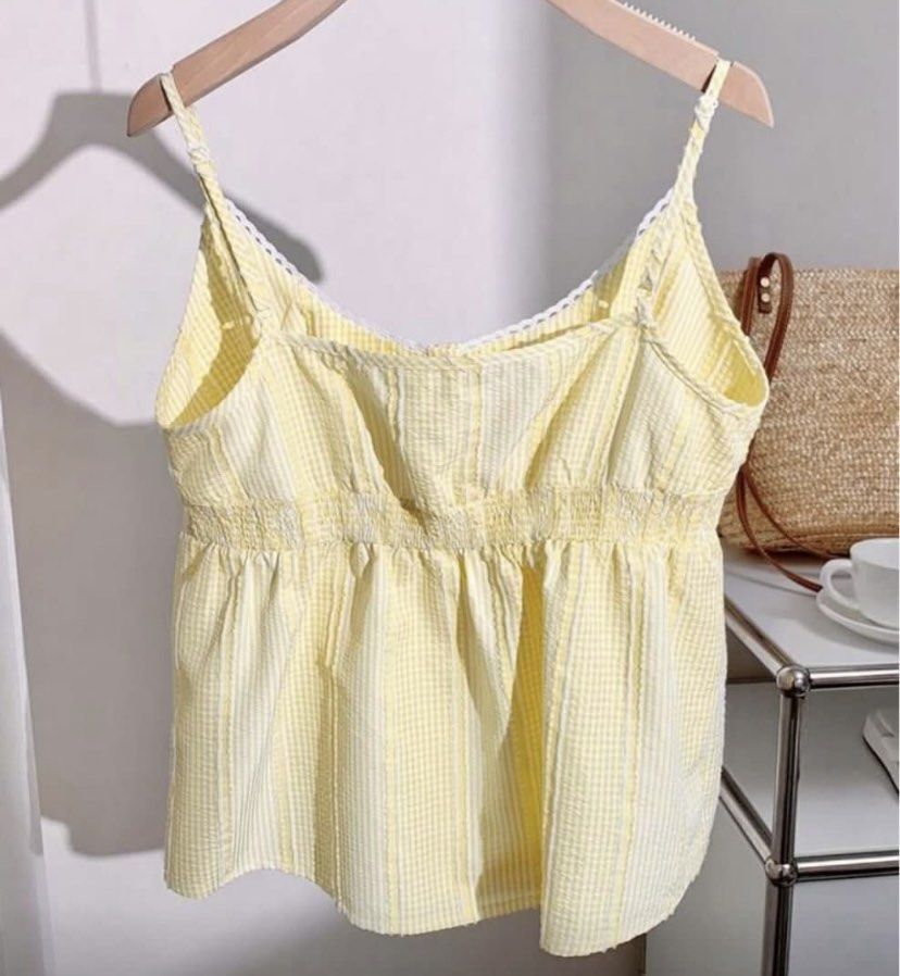 Yellow Gingham Ruffle Strap Tank Top (Category: Sleeveless) located in Mariveles. Submitted by elicopter (Listing ID 1465994229, Image 2). Description: Super cute yellow and white checkered peplum tank top and a smocked back Used twice only, no issues .