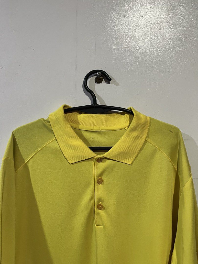 Yellow polo shirt short sleeve button placket (Category: Tshirts & Polo Shirts ) located in Manila. Submitted by updilimangaragesale (Listing ID 1466147211, Image 1). Description: - Color: Bright yellow - Material: Smooth synthetic fabric - Fit: Relaxed fit for all-day comfort - Design: Classic collar with three-button placket and short sleeves - Styling: Easy to pair with your favorite jeans or shorts - Ideal for: Casual wear, everyday errands, 