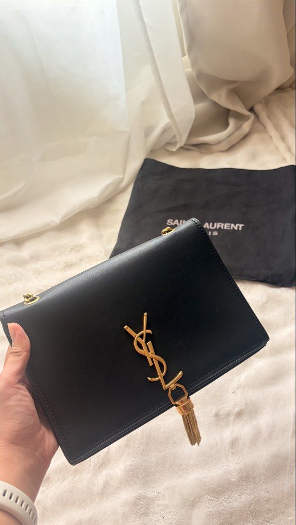 YSL Bag (Category: Purses & Pouches) located in Taguig. Submitted by maggiemajiing (Listing ID 1465971893, Image 2). Description: Bought it 13k. selling it for 1k. Only used thrice. :) cute bag for date night! 💖.