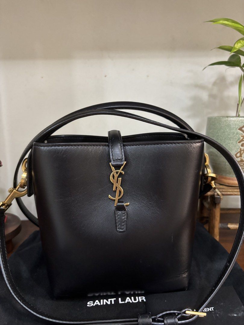 Ysl bucket bag (Category: Luxury Bags & Wallets) located in Quezon City. Submitted by ingridsfinds (Listing ID 1465976909, Image 1). Description: Excellent condition With cards dustbag, Can worn as handbag, shoulder and cross body bag Can fit iphone Small wallet, powerbank.