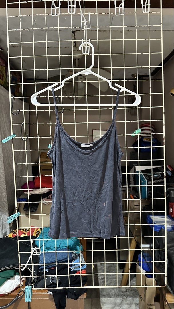 Zara Basic Collection Gray Ribbed Tank Top Medium (Category: Sleeveless) located in Quezon City. Submitted by nsseller (Listing ID 1466109005, Image 1). Description: - Brand: Zara Basic Collection - Size: EUR M / USA M / MEX 28 - Material: Soft ribbed cotton blend (Made in Cambodia) - Design: Scoop neck with thin shoulder straps - Fit: Standard length, easy to style for casual wear.