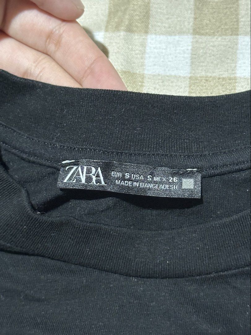 Zara black graphic tee (Category: Shirts) located in Manila. Submitted by vankiaaa (Listing ID 1466016824, Image 2). Description: • used it once • can also fit xs •has mild stain on the left sleeve, but can be cleaned • conditon 10/10 .