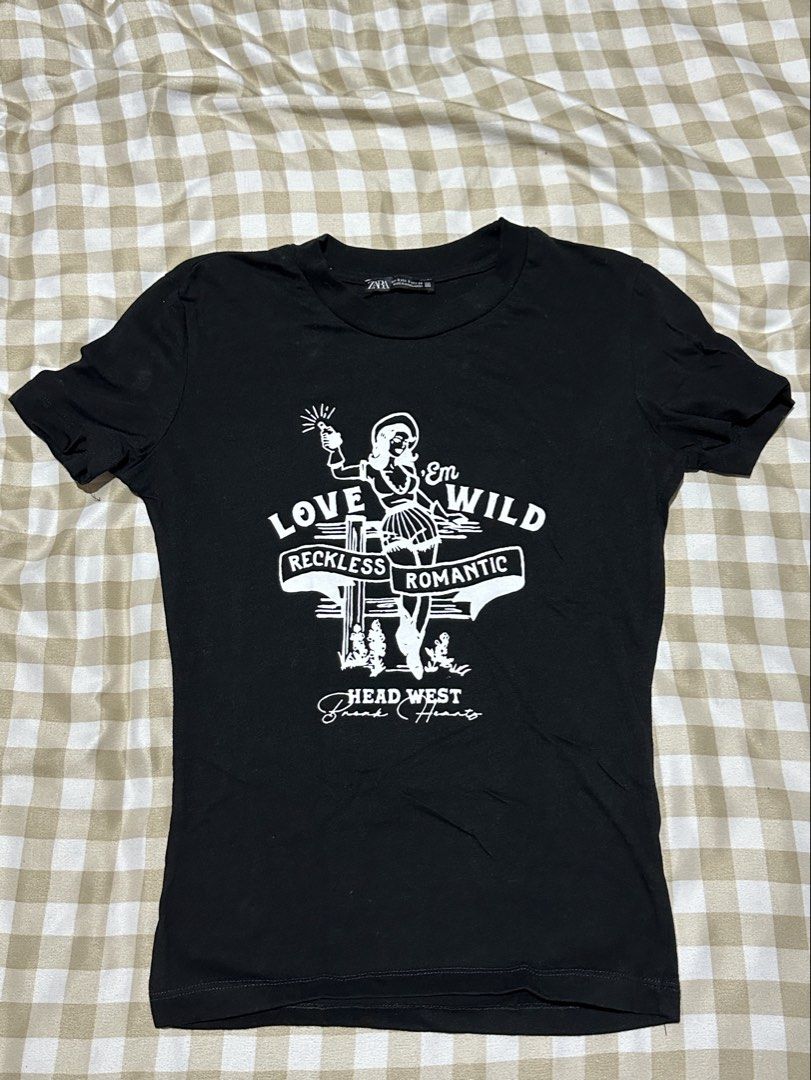 Zara black graphic tee (Category: Shirts) located in Manila. Submitted by vankiaaa (Listing ID 1466016824, Image 1). Description: • used it once • can also fit xs •has mild stain on the left sleeve, but can be cleaned • conditon 10/10 .