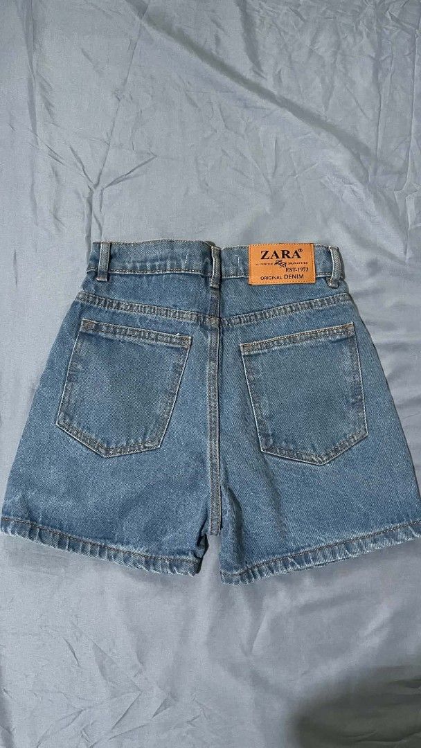 Zara Denim Shorts (Category: Shorts) located in Mandaluyong City. Submitted by aeriiicrochet (Listing ID 1466049851, Image 2). Description: - Brand: Zara - Style: High-waisted denim shorts -used once -W23 L14.