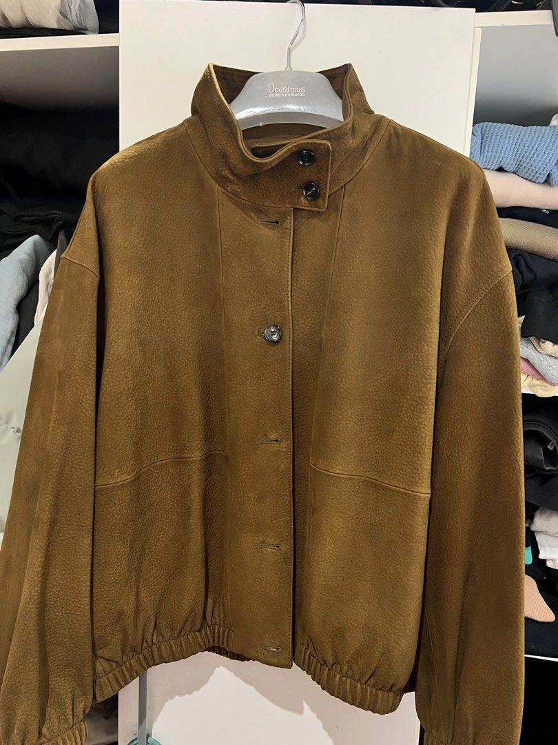Zara Leather Collection Brown Jacket (Category: Coats, Jackets and Outerwear) located in Marikina City. Submitted by patrickmontojo.ramos (Listing ID 1466122533, Image 1). Description: - Brand: Zara (Leather Collection) - Size: XL - Color: Brown - Condition: Brand new with original retail tags attached ($529 retail value) - Material: Soft textured leather - Design: High collar style with front button closure - Details: Elasticized hem and cuffs f