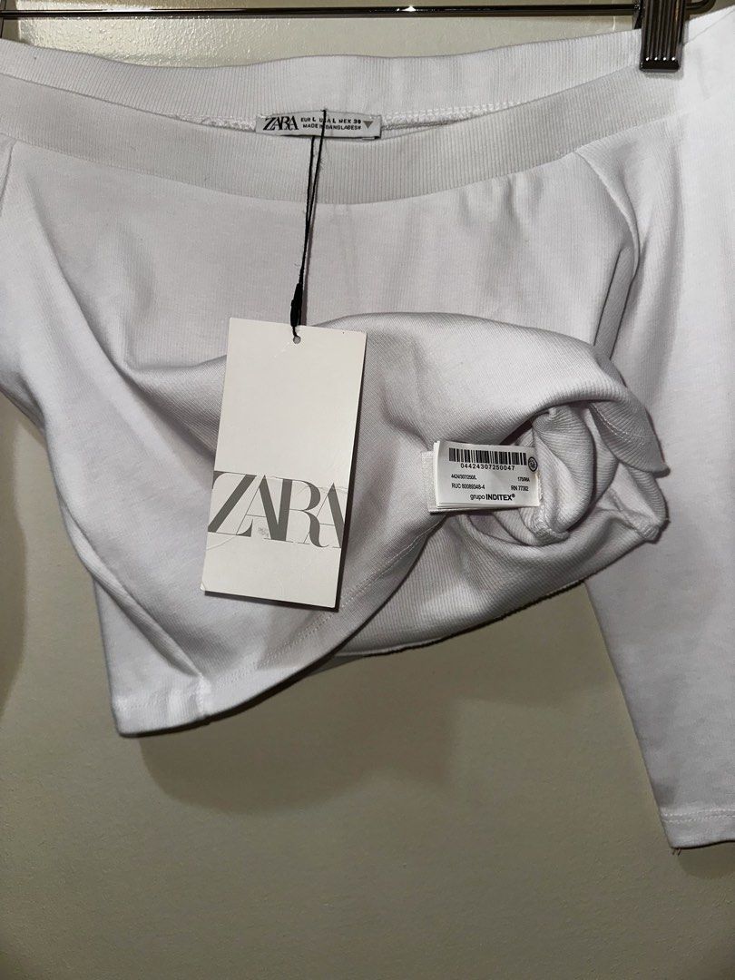 Zara Off Shoulder Top (Category: Blouses) located in Pasig City. Submitted by lovedbymori_ (Listing ID 1466075384, Image 2). Description: New w/ tag! A closet staple you’ll wear on repeat! Super soft and stretchy fabric. .