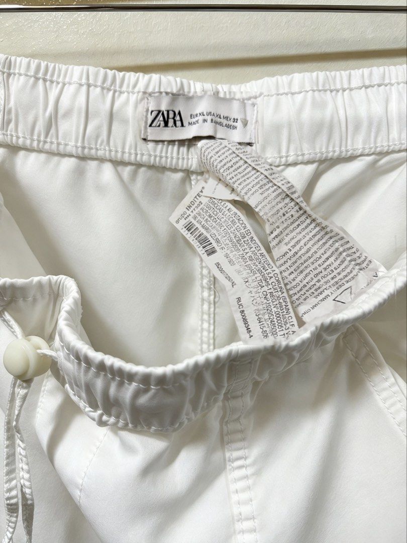 Zara Parachute Cargo Pants (Category: Other Bottoms) located in Pasig City. Submitted by lovedbymori_ (Listing ID 1466079176, Image 3). Description: Worn twice during pregnancy. Has adjustable drawstrings at the waist and leg hems. .