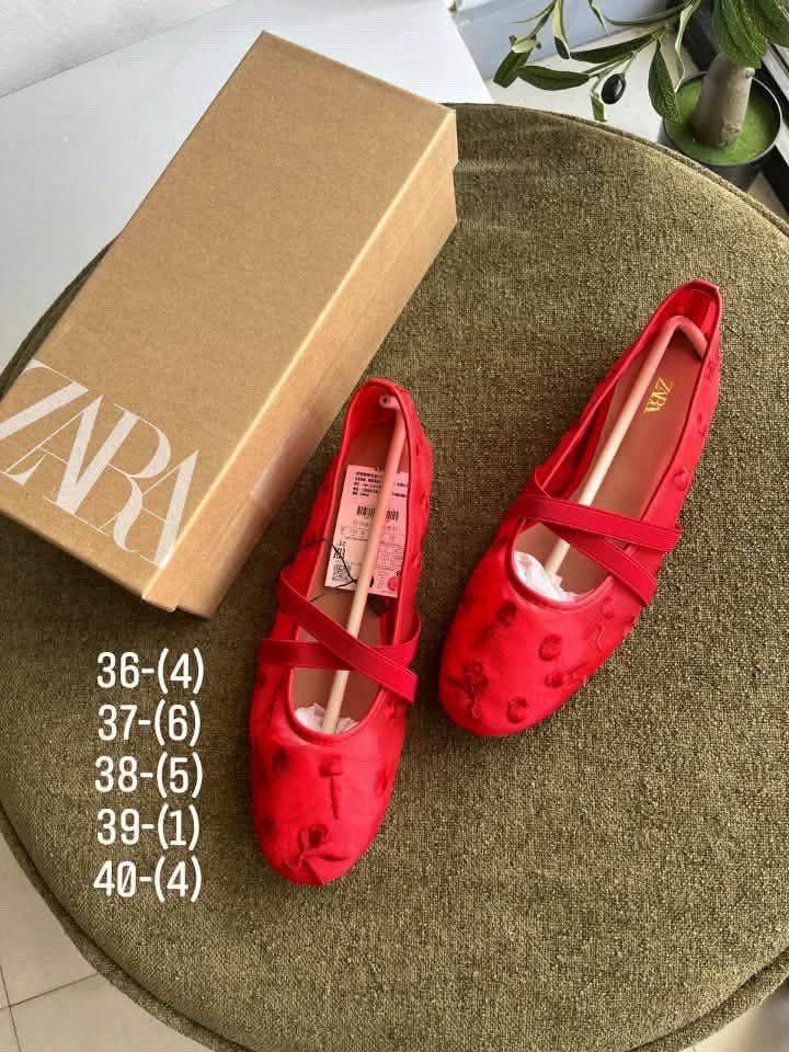 Zara Red Mary Jane Flats (Category: Flats & Sandals) located in Agdangan. Submitted by empressbluemoon (Listing ID 1466032609, Image 1). Description: - Brand: Zara - Style: Red sheer flats with subtle floral embroidery and crossed elastic straps - Condition: Brand new, unworn with original cardboard shoe trees - Packaging: Comes in original Zara shoebox - Available Sizes: 36, 37, 38, 39, 40.