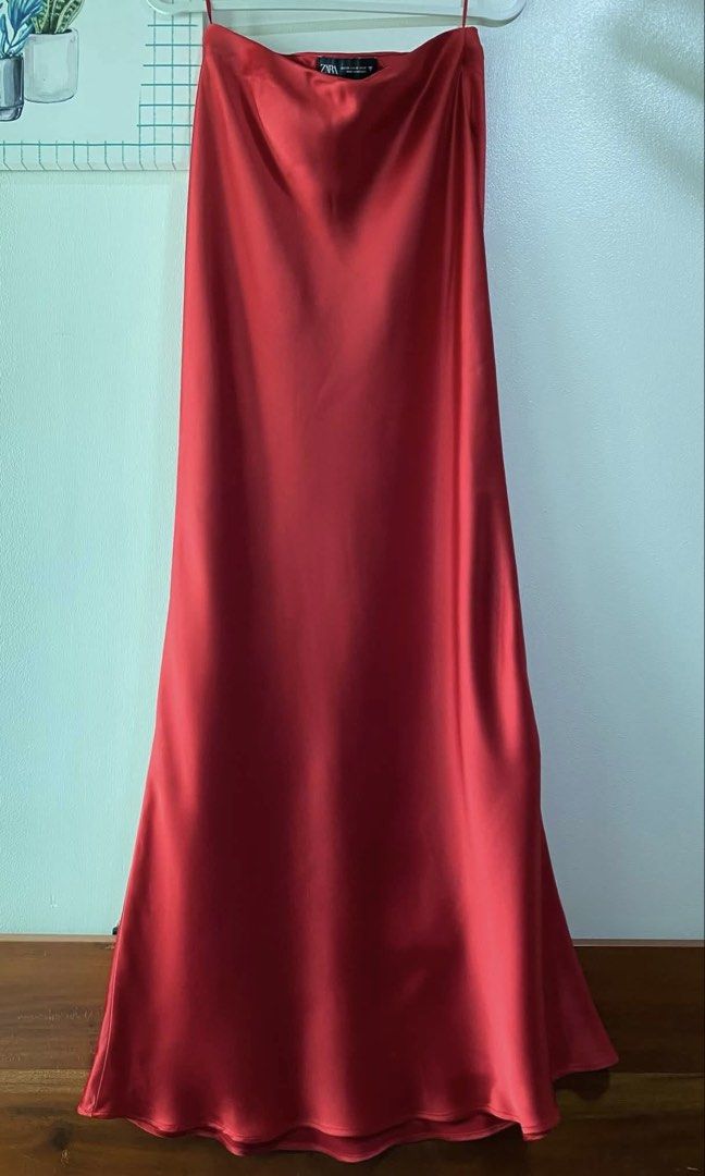 Zara Red Satin Maxi Skirt (Category: Skirts) located in Caloocan City. Submitted by favestop (Listing ID 1463464086, Image 1). Description: - Zara Red Satin Maxi Skirt - Size: XS - Made in Morocco - Versatile: Dress up or down.