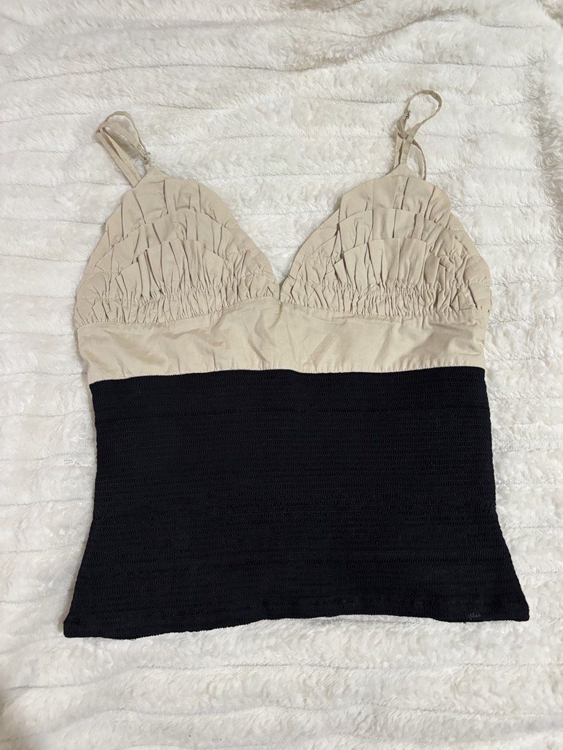 Zara Two-Tone Ruffled Camisole Top Size S (Category: Sleeveless) located in Quezon City. Submitted by hadescloset (Listing ID 1465956974, Image 1). Description: - Used once - Brand: Zara - Size: S (tag attached) - Color: Beige and black - Material: Cotton and elastane blend - Features: Adjustable shoulder straps, ruched ruffle cups, stretchy smocked lower section, side zipper closure - Condition: Clean inside and out, great casual piece for warme