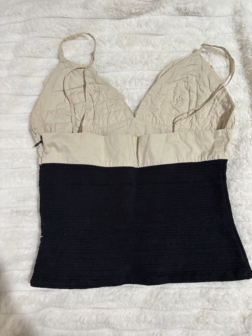Zara Two-Tone Ruffled Camisole Top Size S (Category: Sleeveless) located in Quezon City. Submitted by hadescloset (Listing ID 1465956974, Image 2). Description: - Used once - Brand: Zara - Size: S (tag attached) - Color: Beige and black - Material: Cotton and elastane blend - Features: Adjustable shoulder straps, ruched ruffle cups, stretchy smocked lower section, side zipper closure - Condition: Clean inside and out, great casual piece for warme