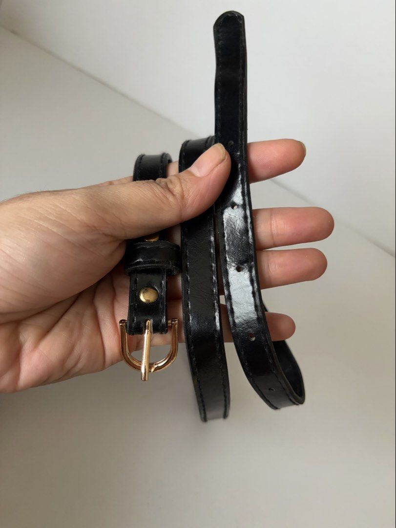 10. Black Slim Leather Belt (Category: Belts) located in Quezon City. Submitted by wagwagan_ukay_blues (Listing ID 1466232663, Image 3). Description: From Japan In good condition Please expect signs of usage Hole Size -24”-29” Overall - 32” Width -.5” Novaliches Qc.