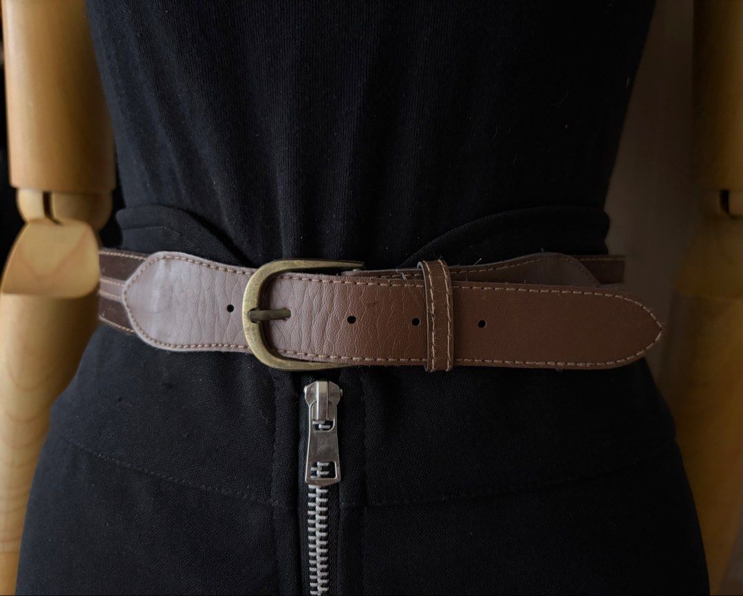 10. Brown Leather Belt 61 (Category: Belts) located in Quezon City. Submitted by wagwagan_ukay_blues (Listing ID 1466234265, Image 2). Description: From Japan In good condition Please expect signs of usage Hole Size -27.5”-30.5” Overall - 33” Width -1.1” Novaliches Qc.