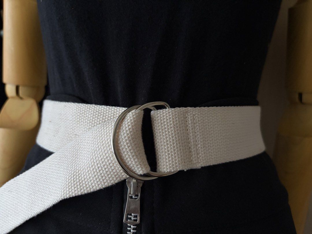 10. White Canvas Belt (Category: Belts) located in Quezon City. Submitted by wagwagan_ukay_blues (Listing ID 1466229505, Image 2). Description: From Japan In good condition Please expect signs of usage Overall - 44” Width -1.5” Novaliches Qc.