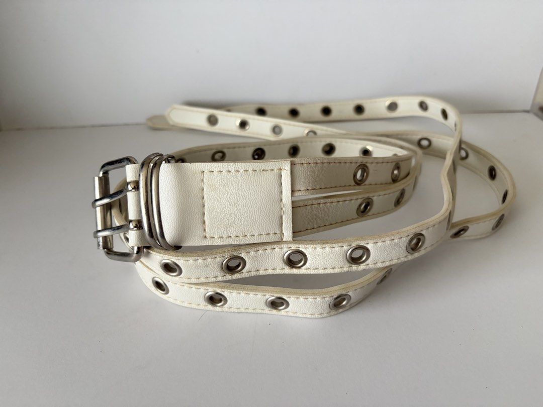 10. White Double Leather Belt (Category: Belts) located in Quezon City. Submitted by wagwagan_ukay_blues (Listing ID 1466228970, Image 2). Description: From Japan In good condition Please expect signs of usage ❗️missing one metal hole Hole Size -up yo 41” Overall - 42” Width -1.5” Novaliches Qc.
