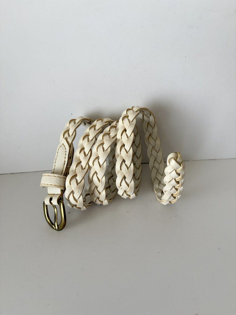 10. White Slim Braided Leather Belt (Category: Belts) located in Quezon City. Submitted by wagwagan_ukay_blues (Listing ID 1466238252, Image 1). Description: From Japan In good condition Please expect signs of usage Overall - 35” Width -.6” Novaliches Qc.